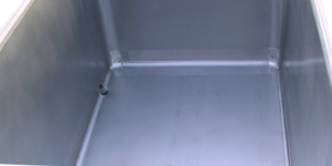 Stainless steel containers with skids